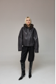 Short sheepskin coat with a hood made of natural sheepskin in graphite color